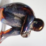 uomo-rannicchiato-2